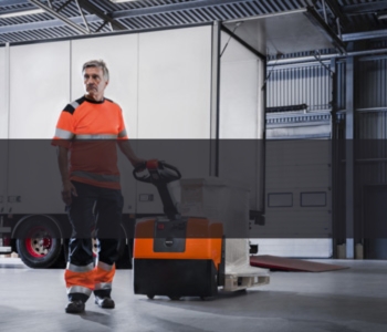 Toyota pedestrian pallet truck unloading lorry